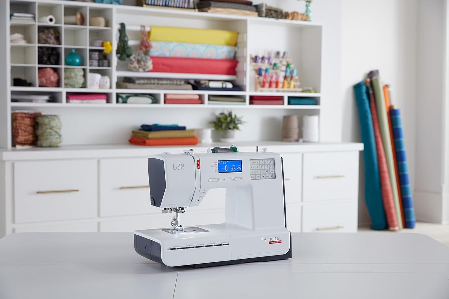 Bernette B38 Computerized Sewing Machine with Extension Table, Rotary Cutter, Scissors & Deluxe Presser Foot Kit