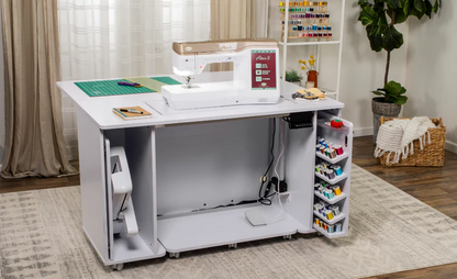 Spacious sewing cabinet with a sewing machine, pull-out thread storage, and workspace for crafting