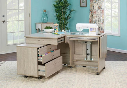 Spacious wooden sewing cabinet with open drawers and a built-in sewing machine